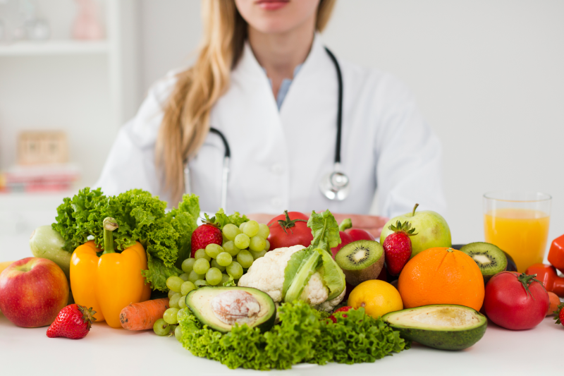 diet concept with female scientist healthy food